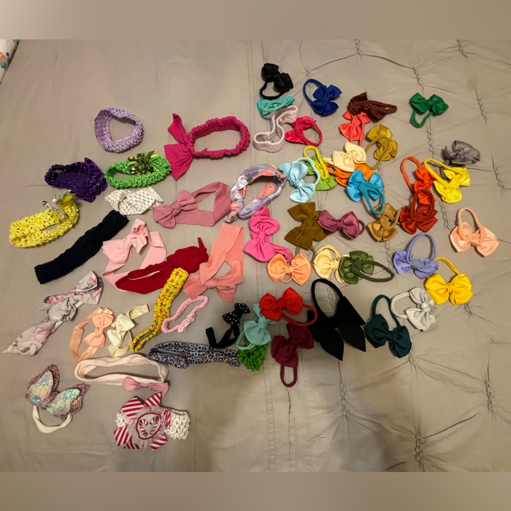 Bundle of 56 baby headbands.